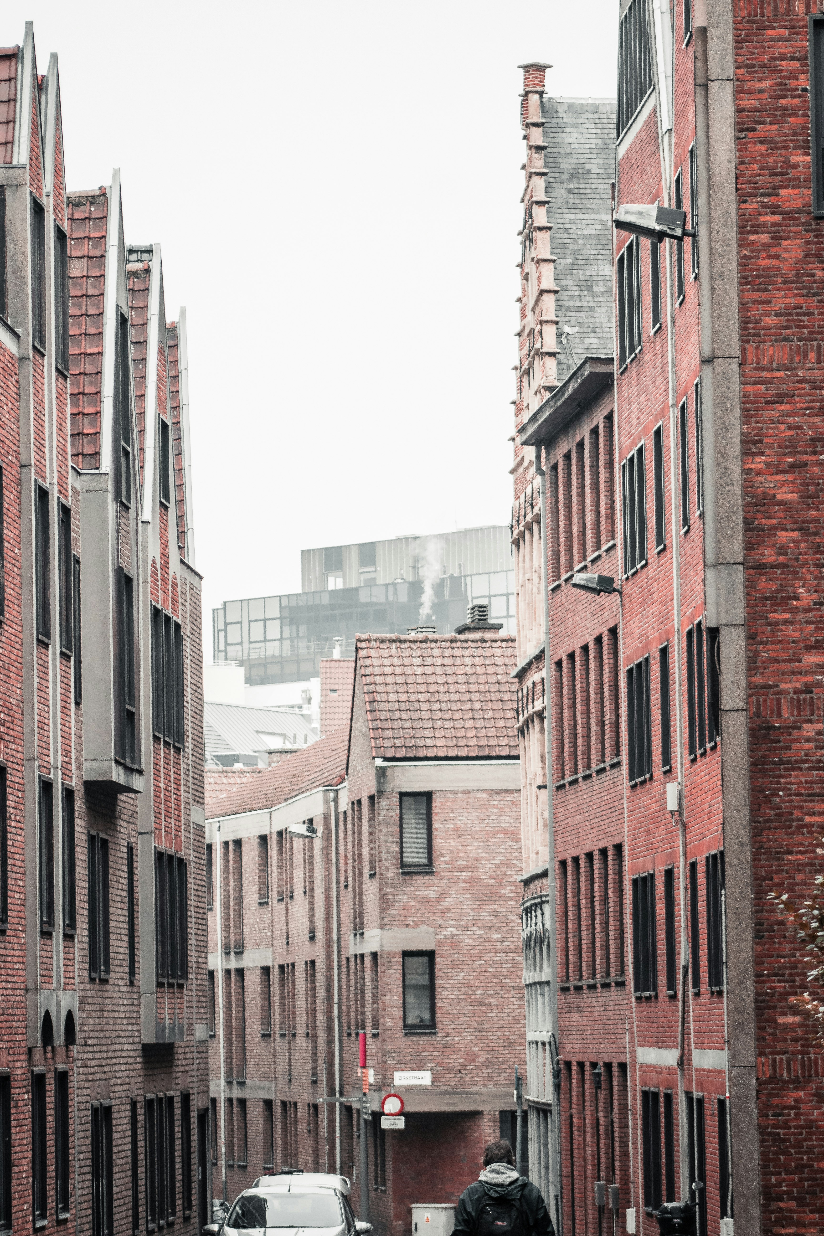 brown and white concrete building during daytime