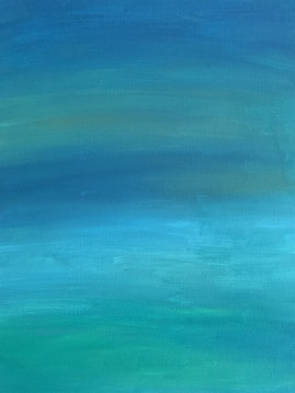 A gradient of soothing blue and green hues blending smoothly from dark to light, creating a tranquil and calming effect.