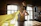 Photo of a joyful woman stretching gracefully in a dance studio with natural light.