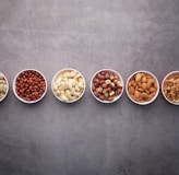 brown nuts on white ceramic bowls-topic-How Much Proteins Do You Need