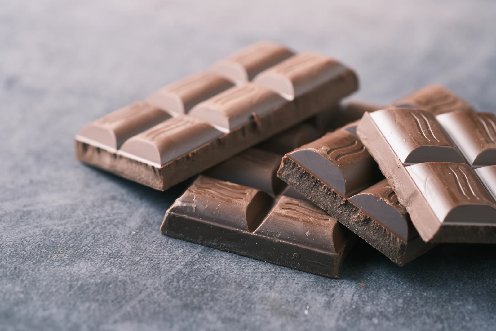 Dark chocolate bar on a black table