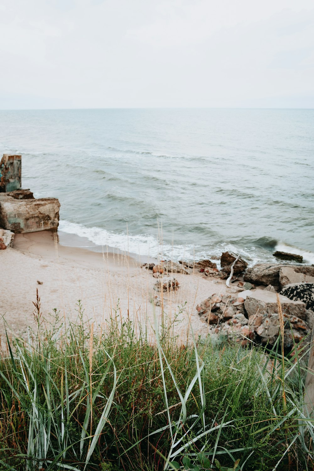 brown rock formation on seashore during daytime