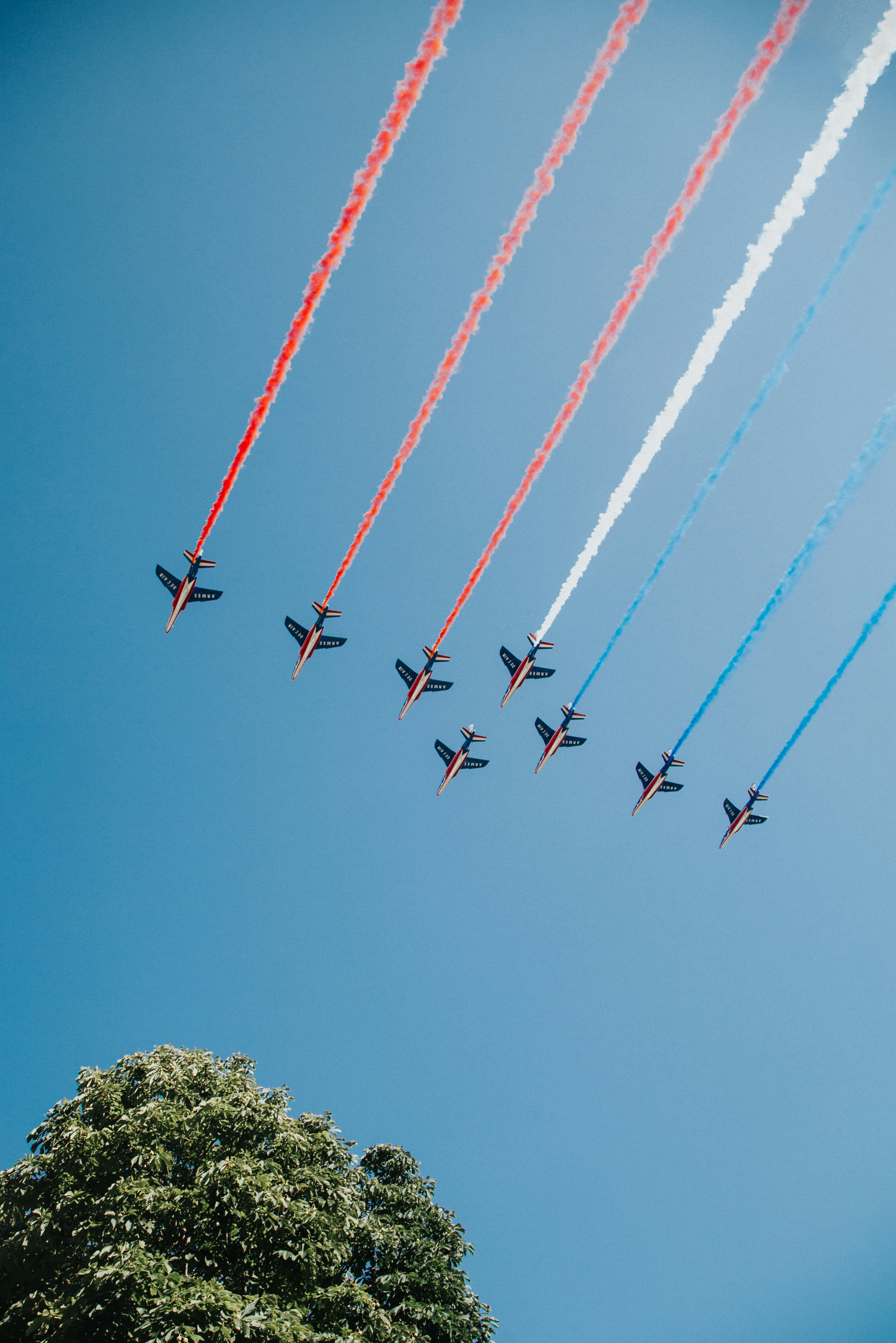 red and white plane in the sky