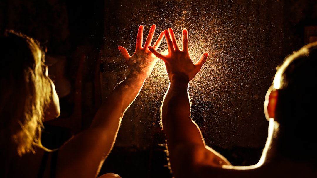 persons hand with light