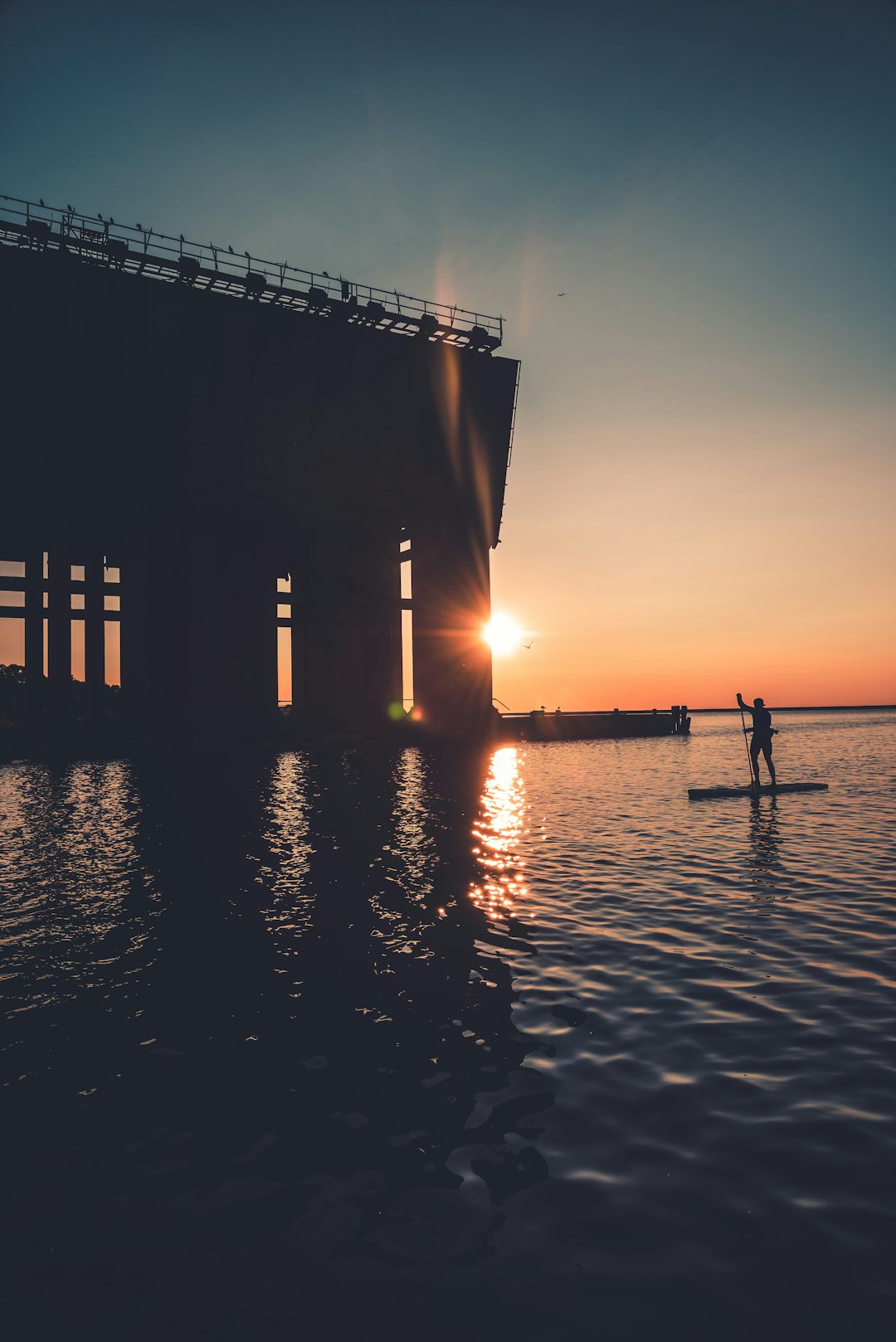 silhouette of bridge during sunset