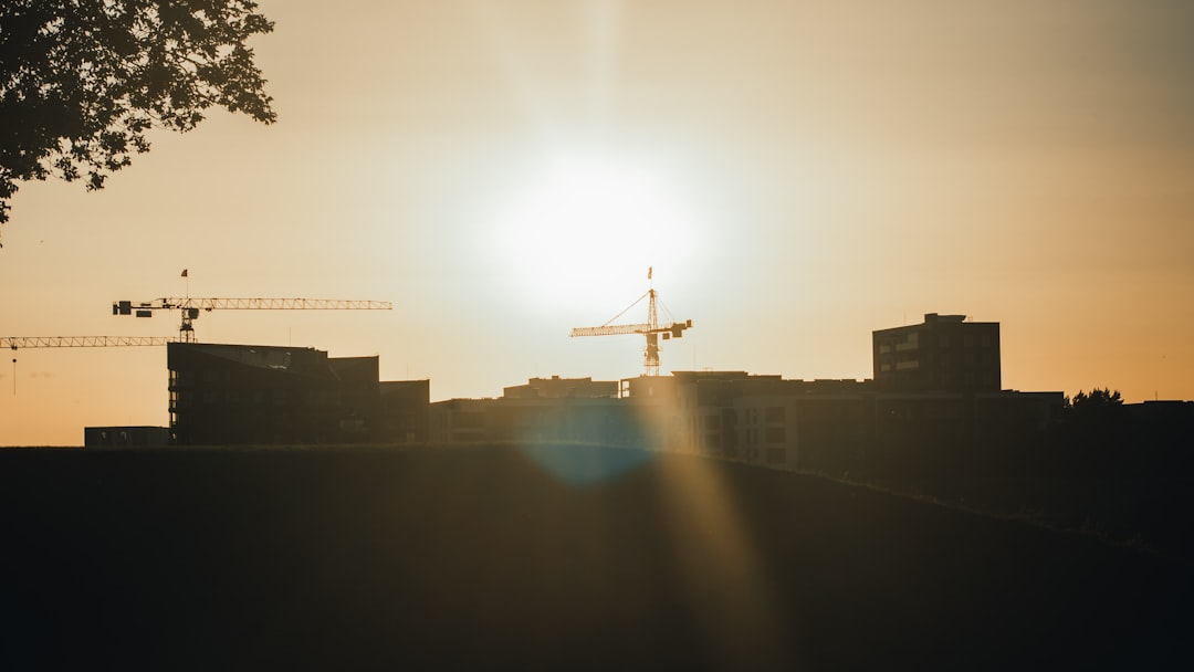 silhouette of building during sunset