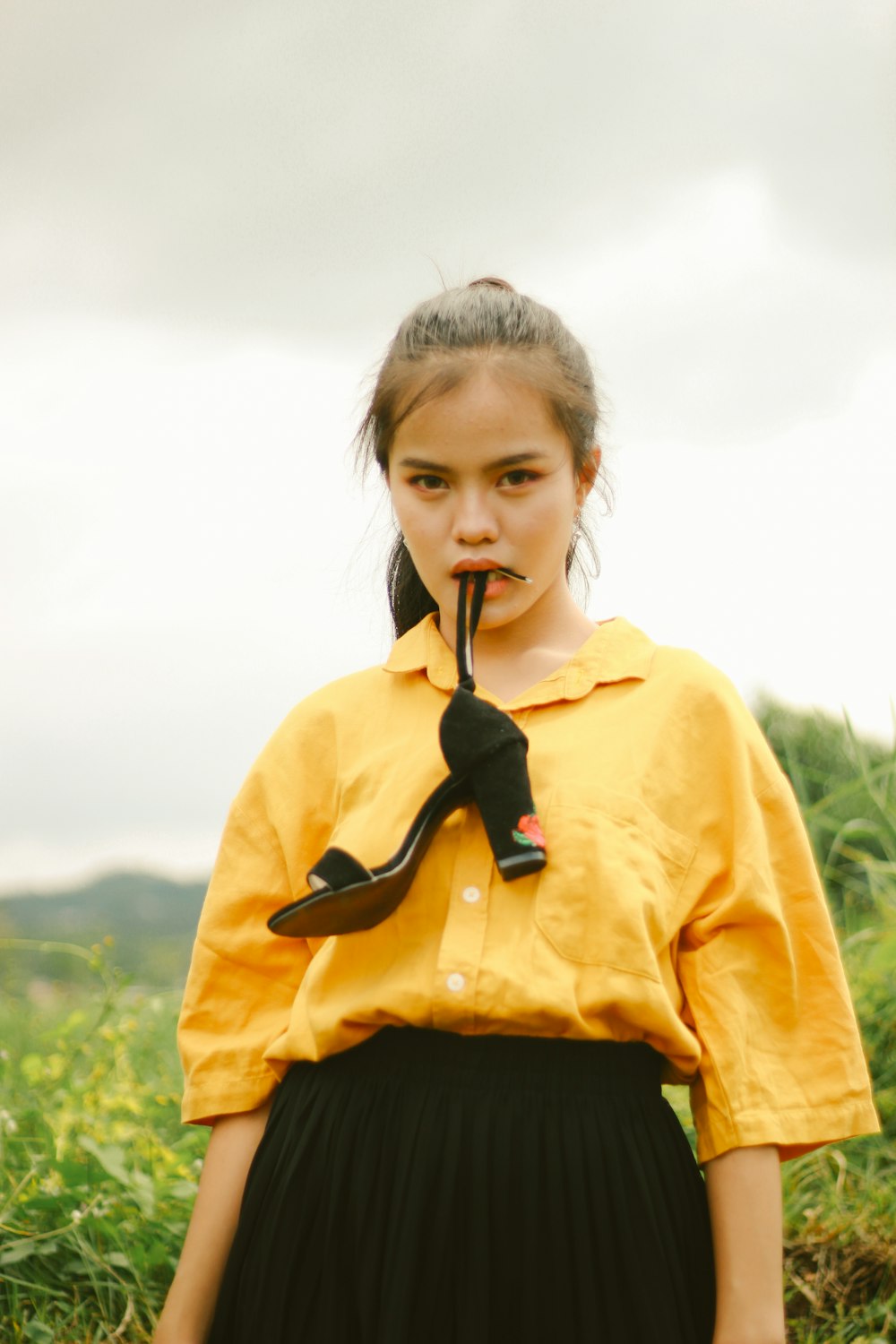 girl in yellow and black jacket