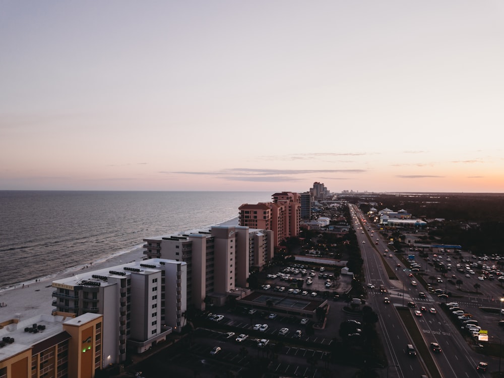 city buildings near body of water during daytime