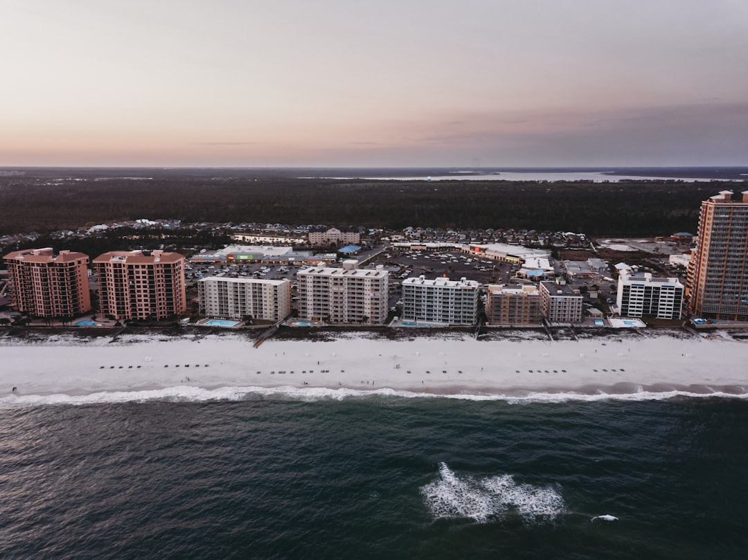 city buildings near sea during daytime