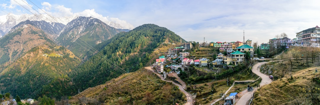 aerial view of city near mountain during daytime