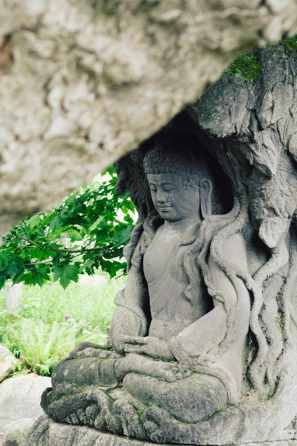 brown concrete statue of man