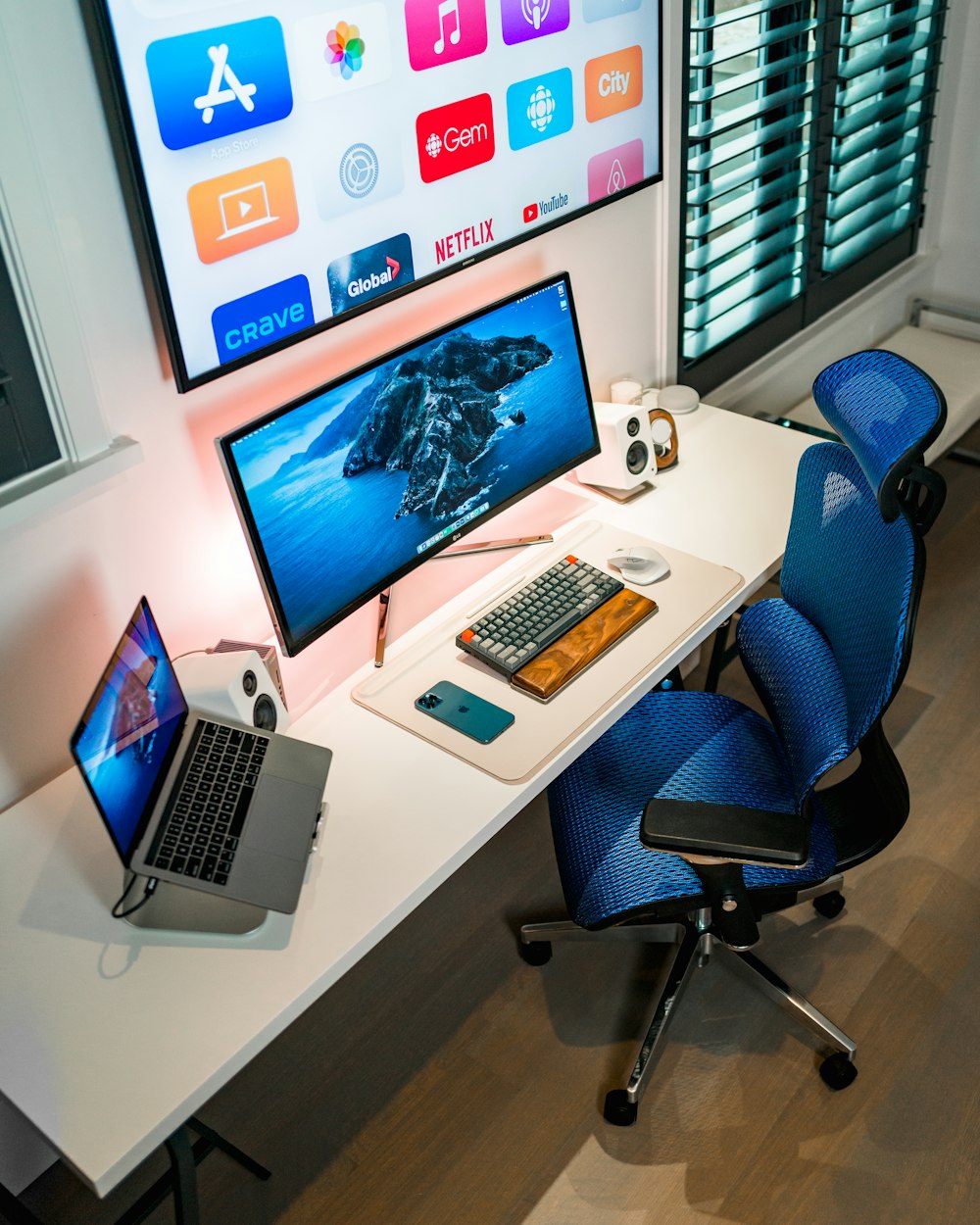 macbook pro on white table