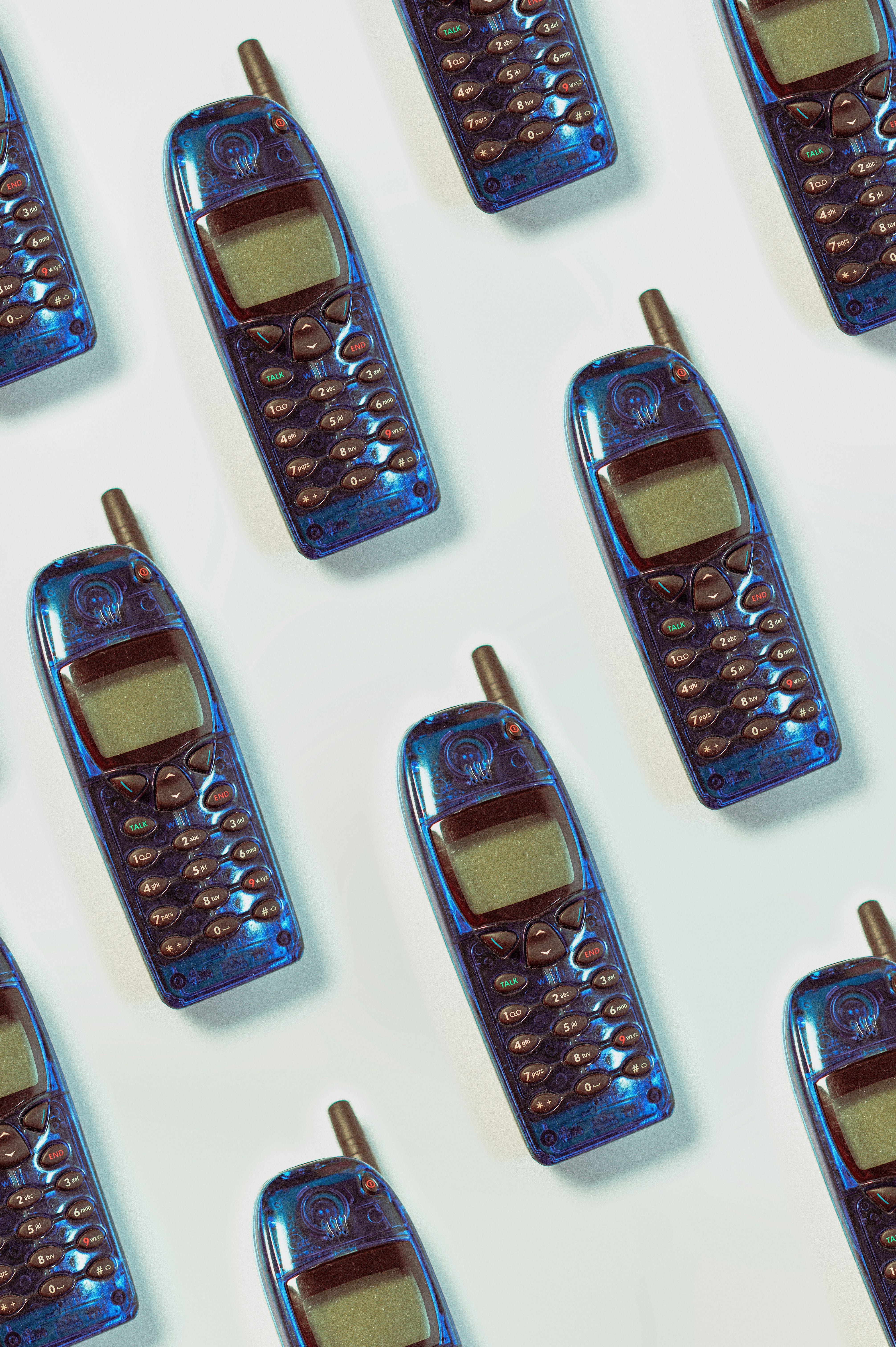 clear blue array of nokia's 6110 on white background.