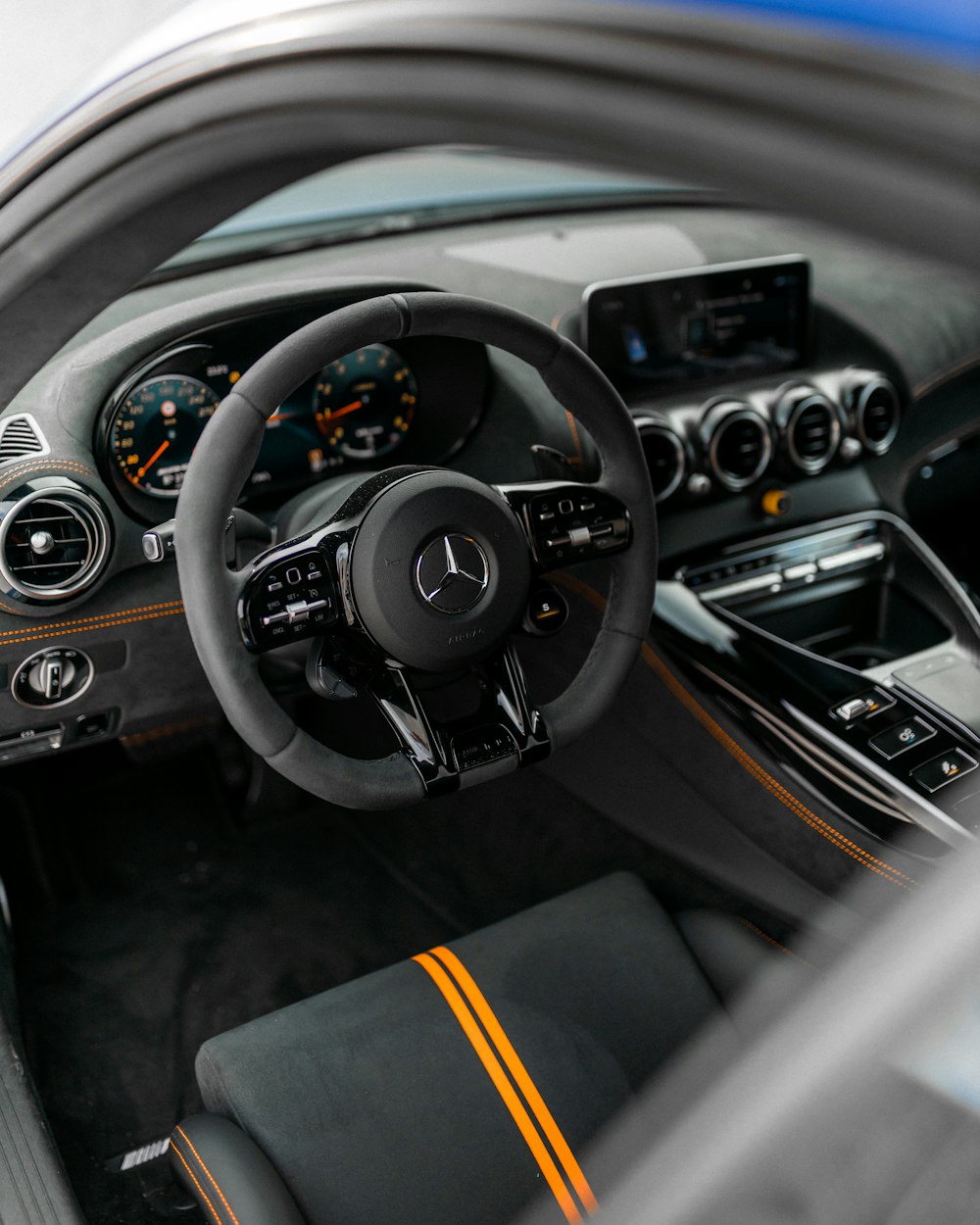 black and silver car steering wheel