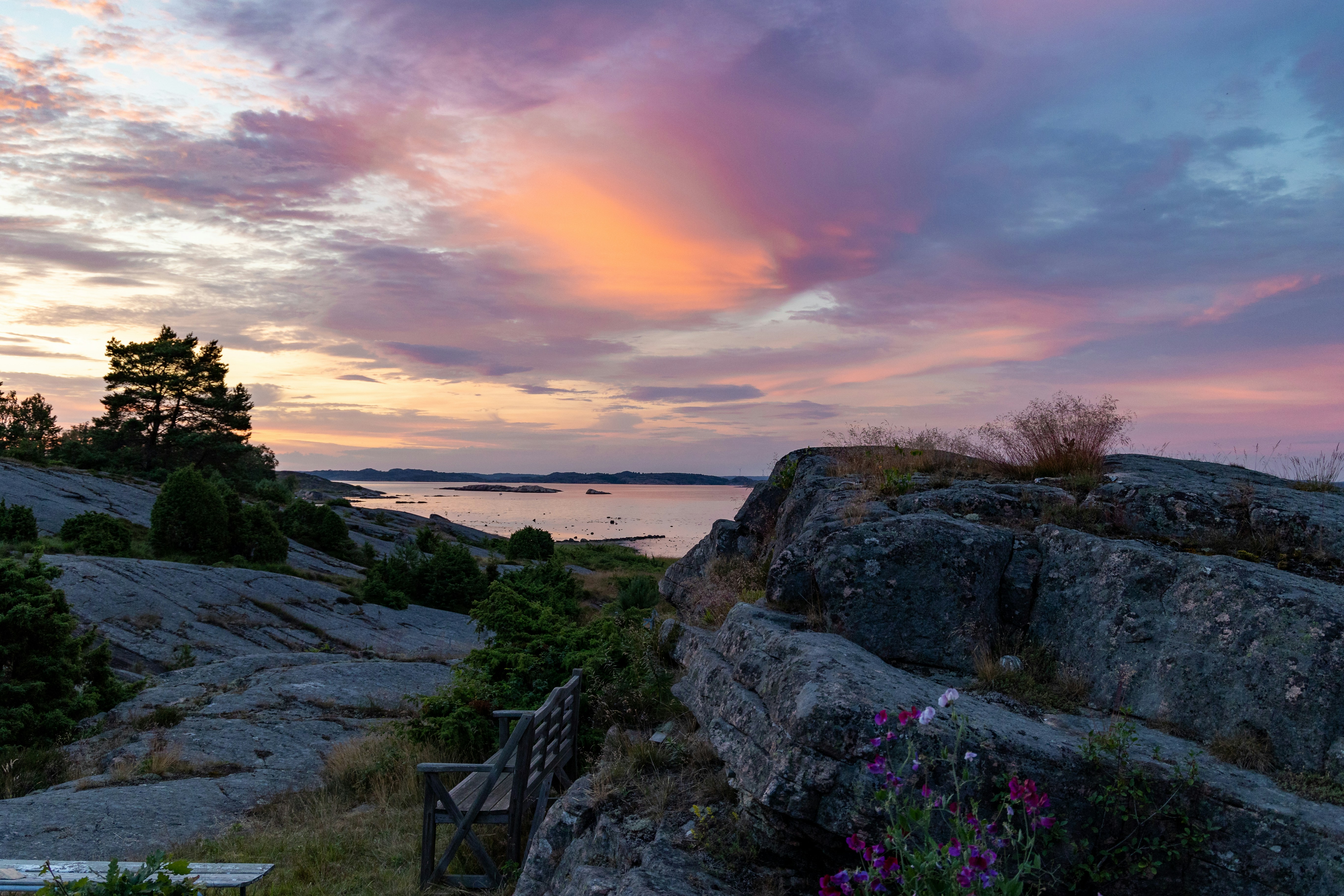Pink clouds reflect a setting sun on the Swedish west coast. Taken with the Canon R6.