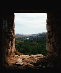 Window view from the couple’s room showing the serene river valley.