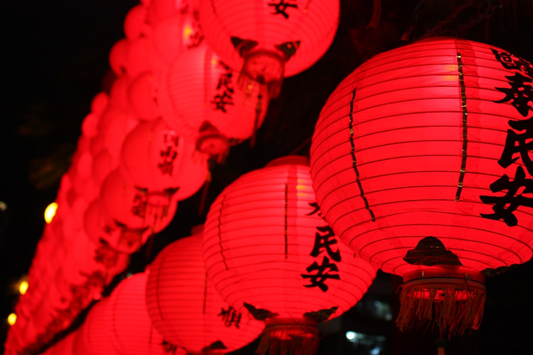 red paper lantern during night time