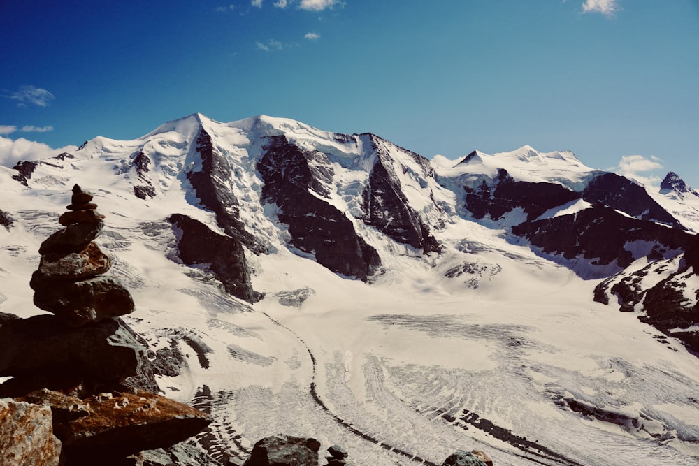 snow covered mountain under blue sky during daytime