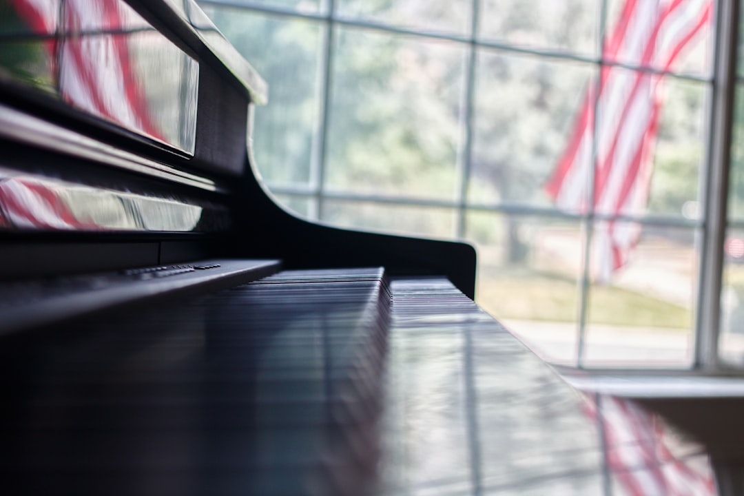 brown wooden table near window