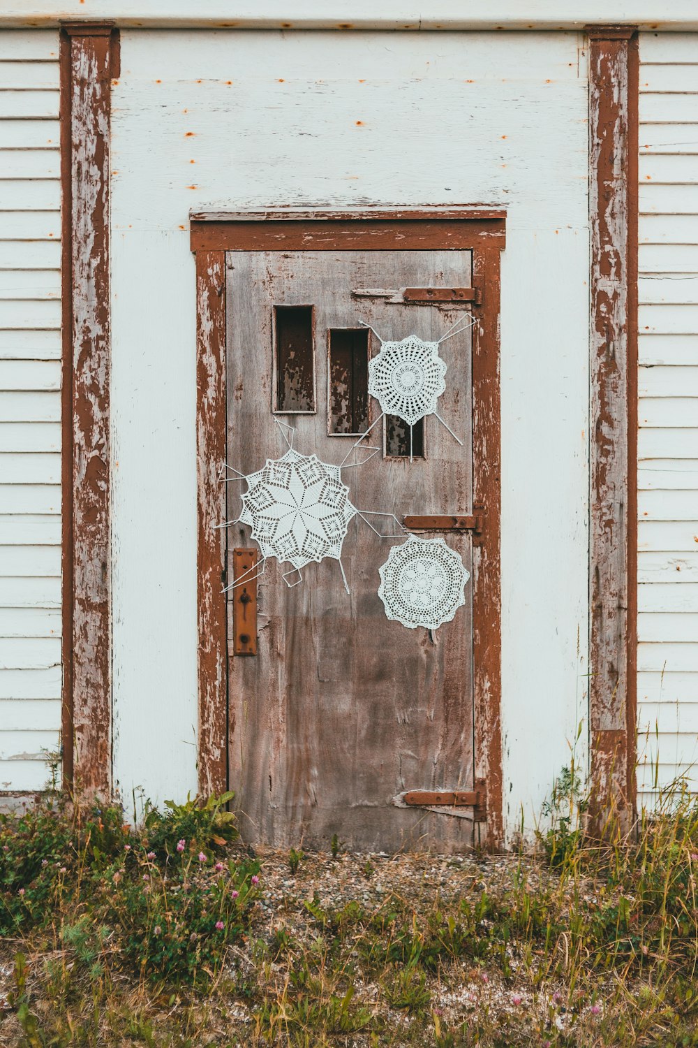 white and brown wooden door