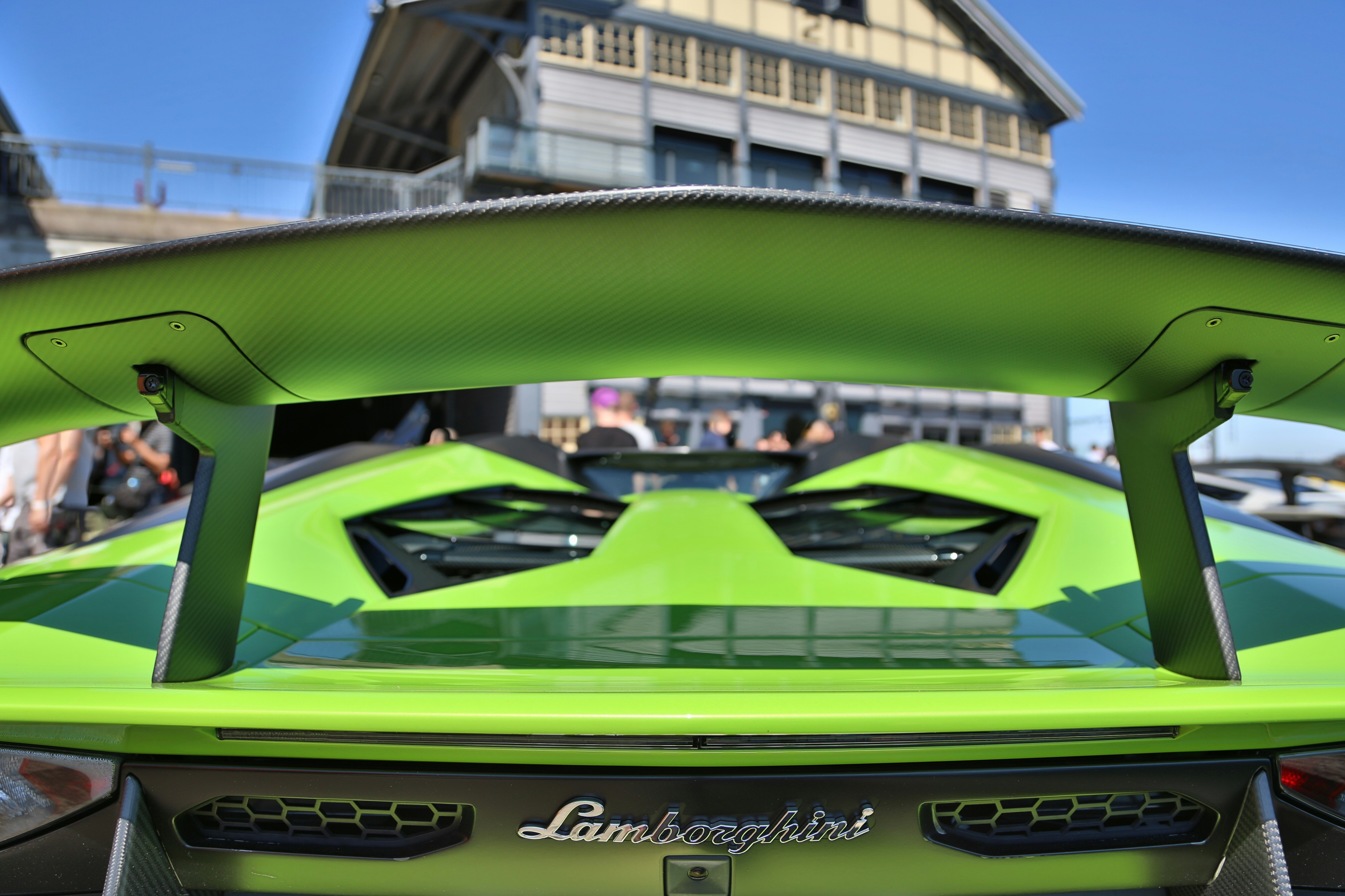 green and black chevrolet camaro