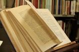 white book page on brown wooden table