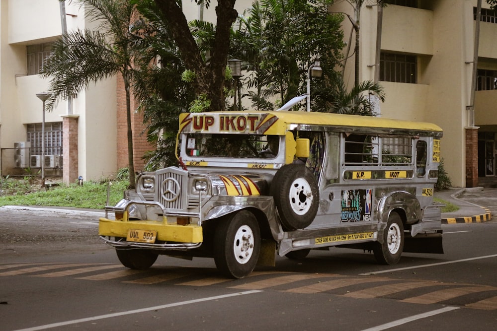 yellow and white bus on road during daytime