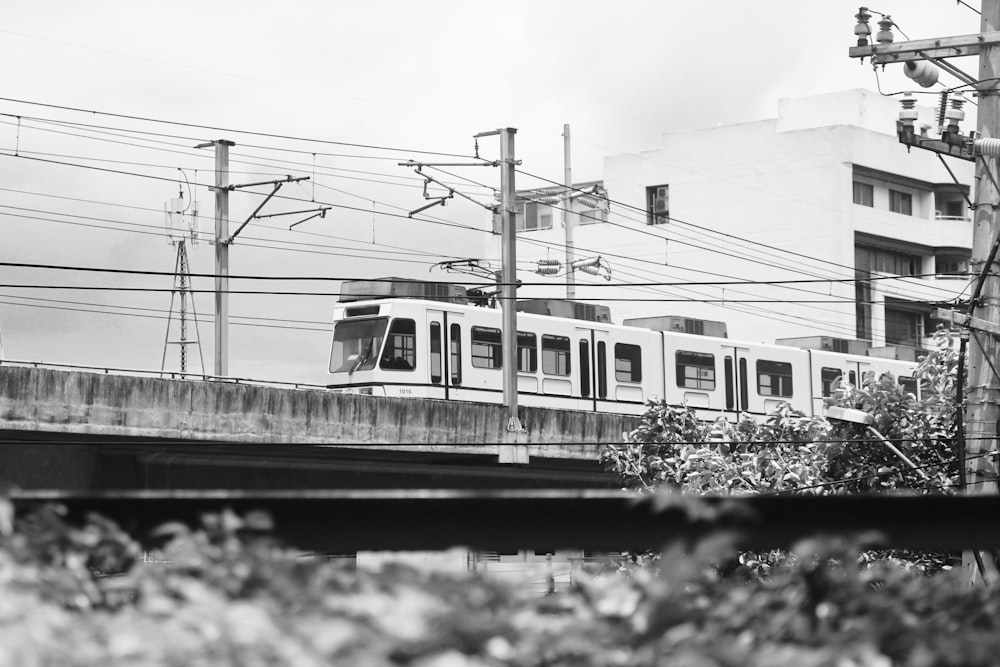 grayscale photo of train on rail