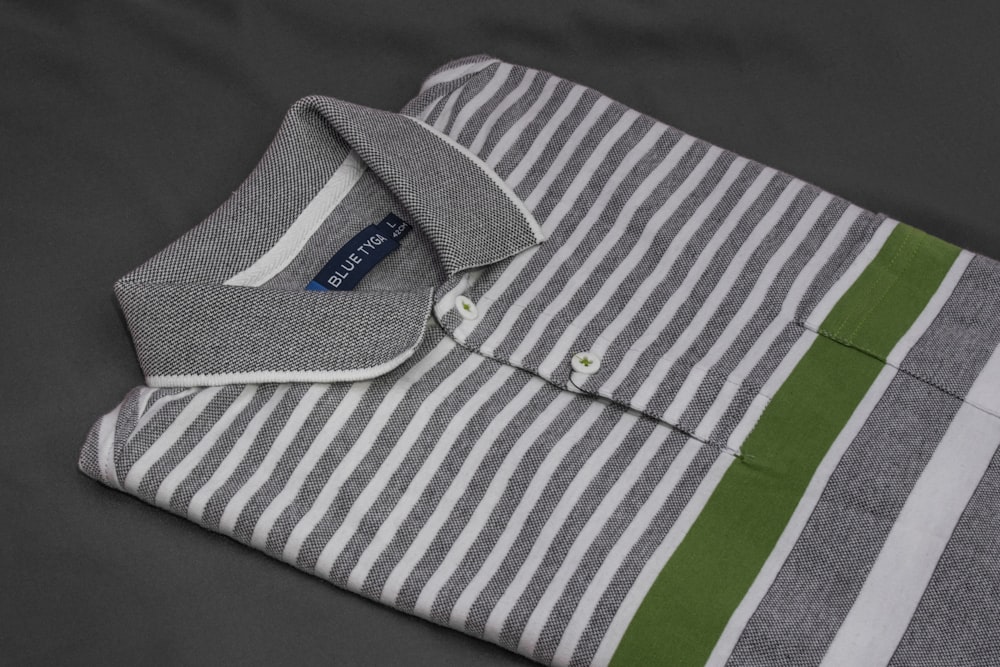 white and green striped polo shirt