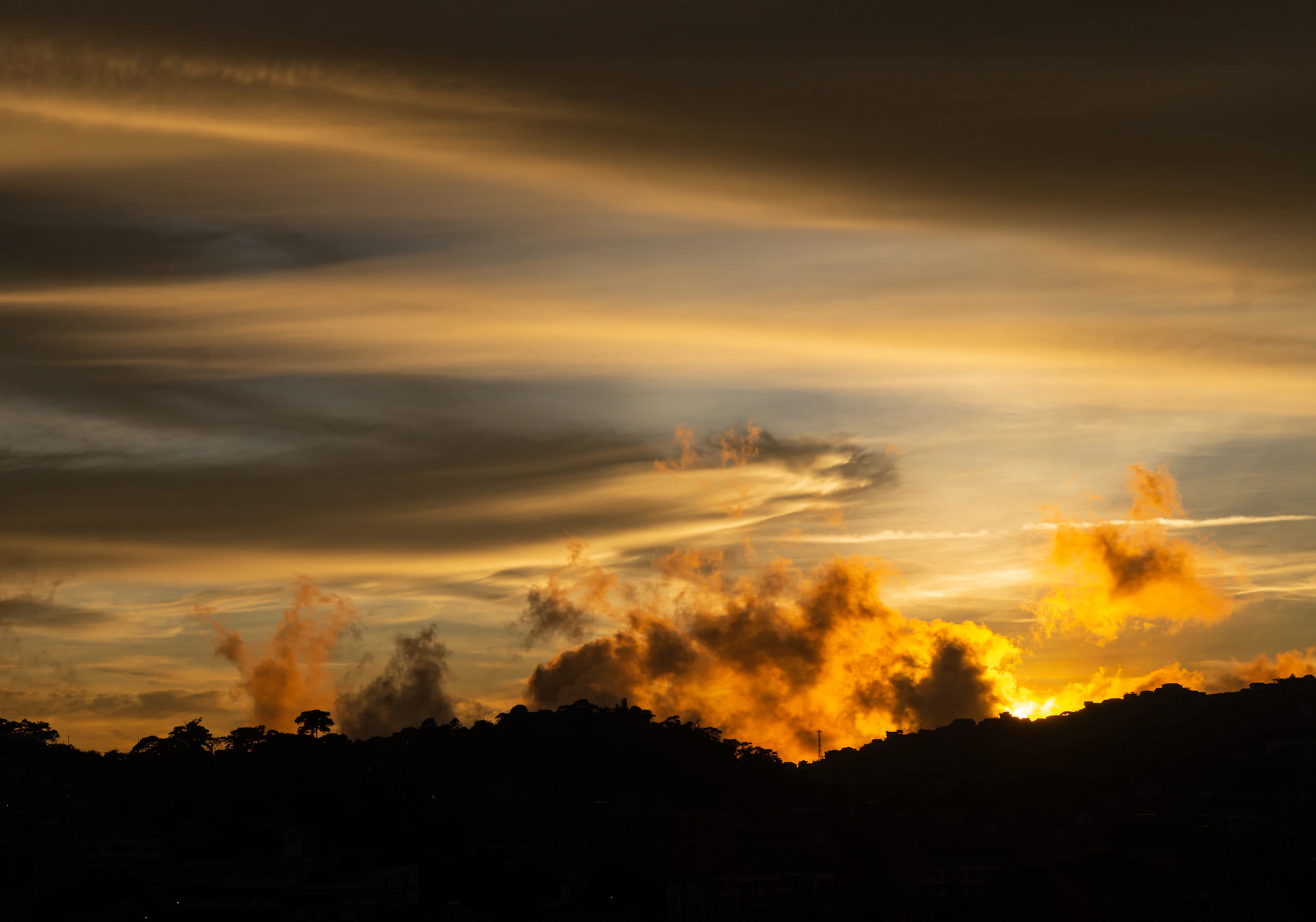 silhouette of mountain during sunset