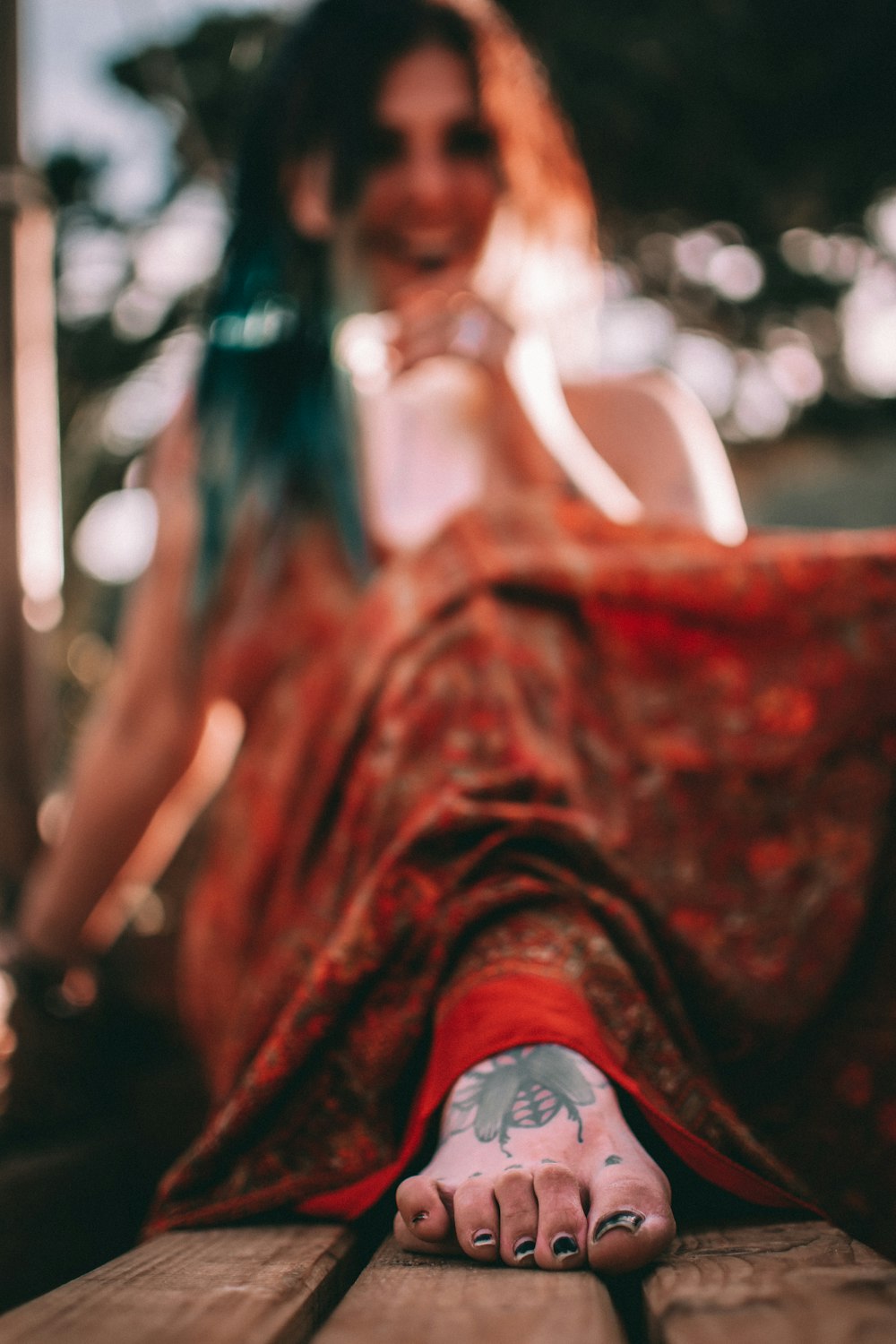 woman in red and brown dress