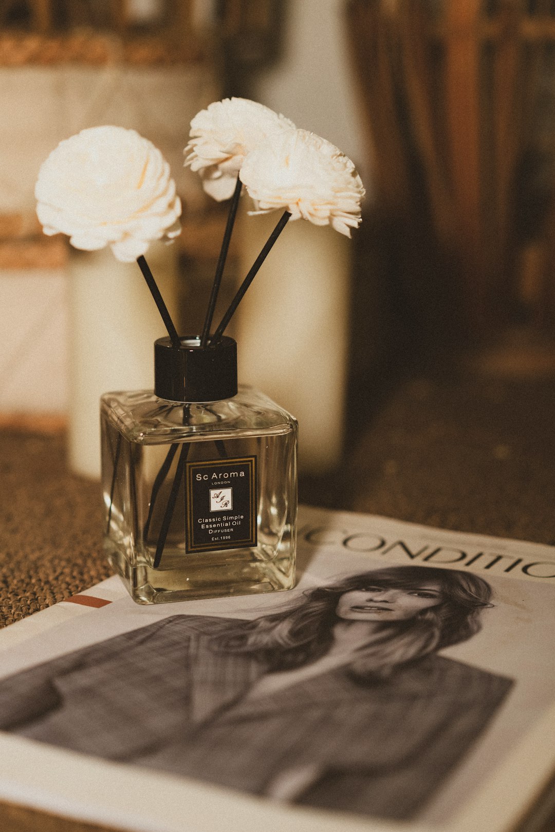 white rose on glass bottle