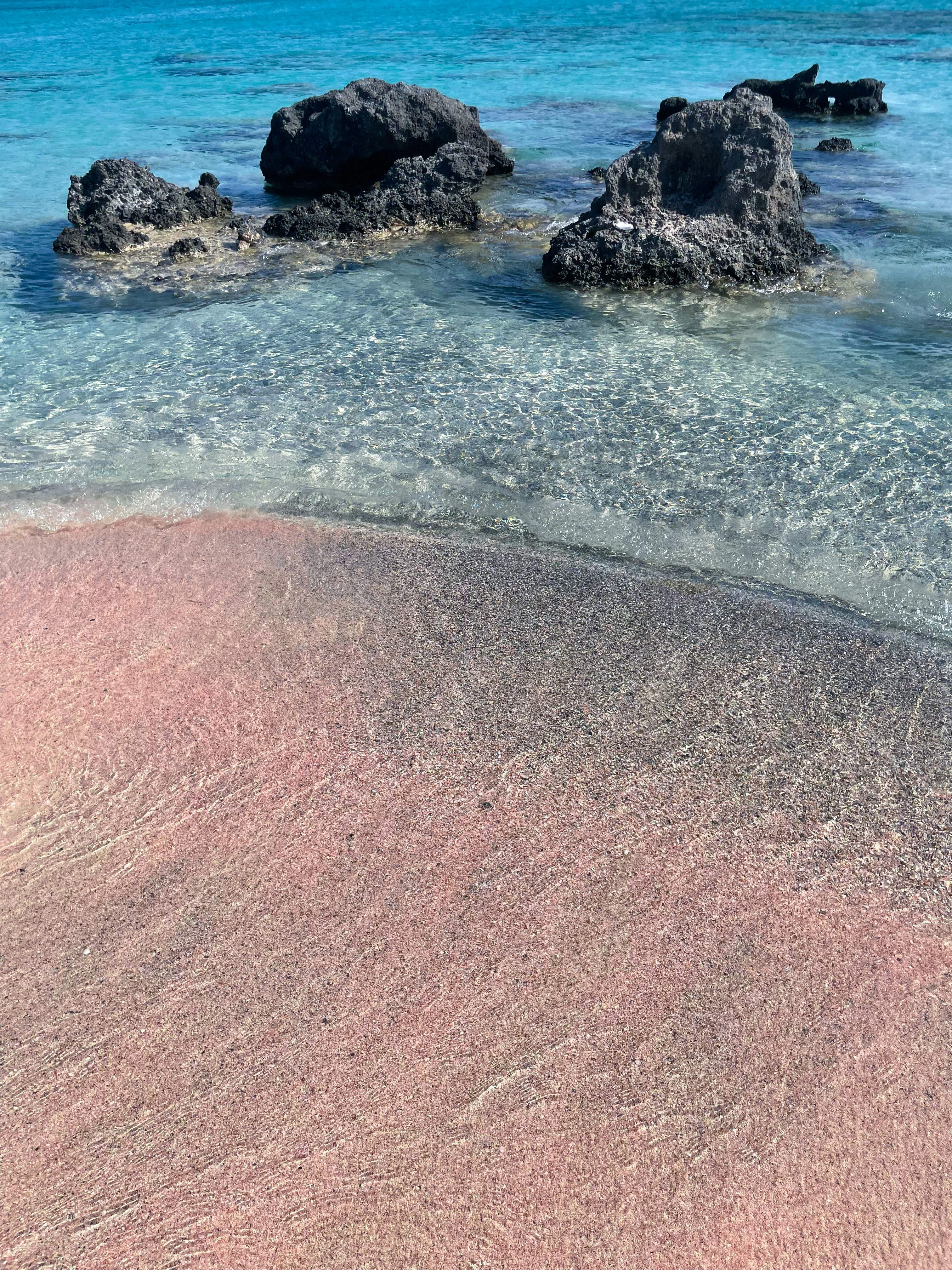 ocean waves crashing on shore during daytime