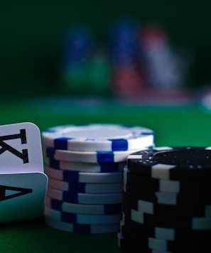 white and black dice on green table