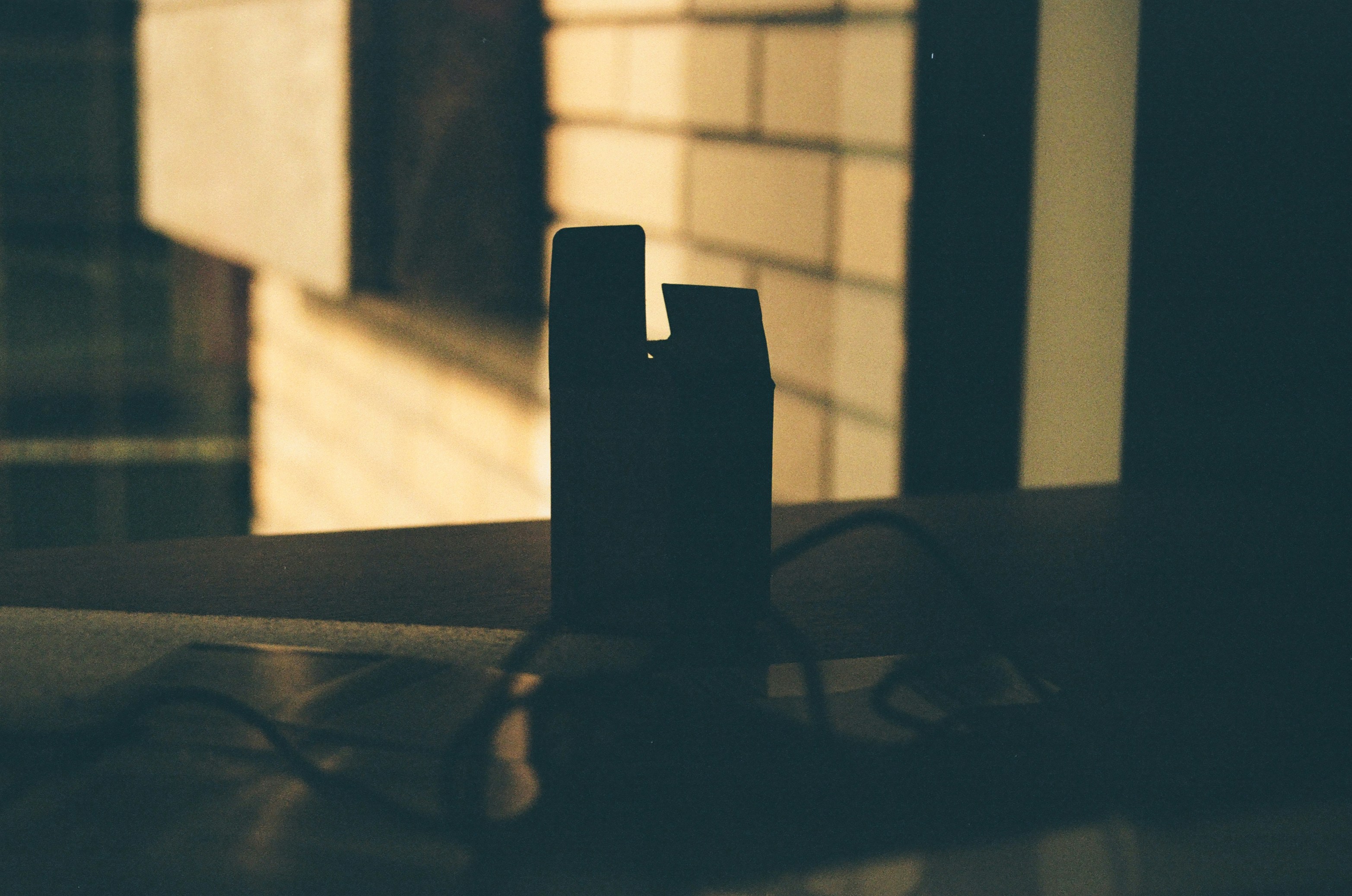 black power brick on brown wooden table