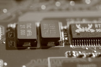 Close-up image of a vintage radio circuit board with visible traces and components.