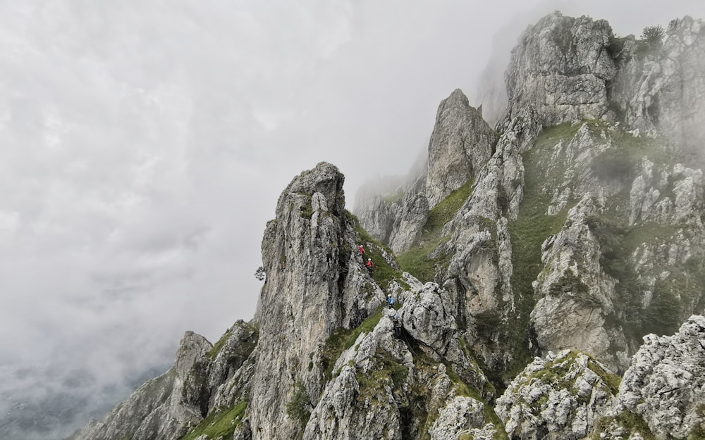 gray rocky mountain under white sky during daytime