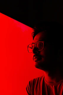 man in black framed eyeglasses