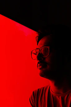 man in black framed eyeglasses