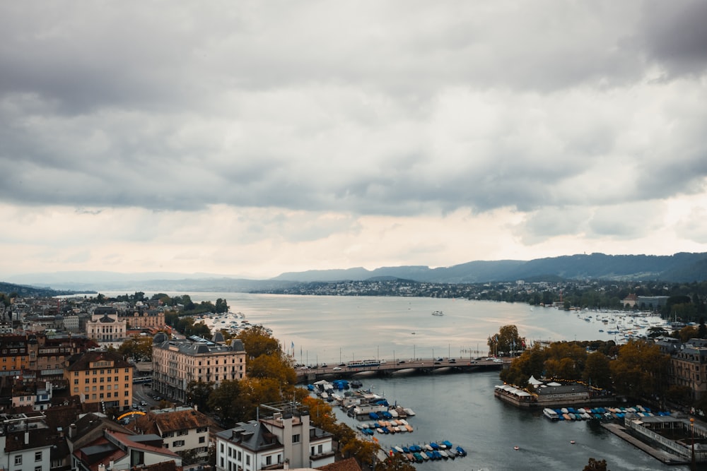 aerial view of city near body of water during daytime