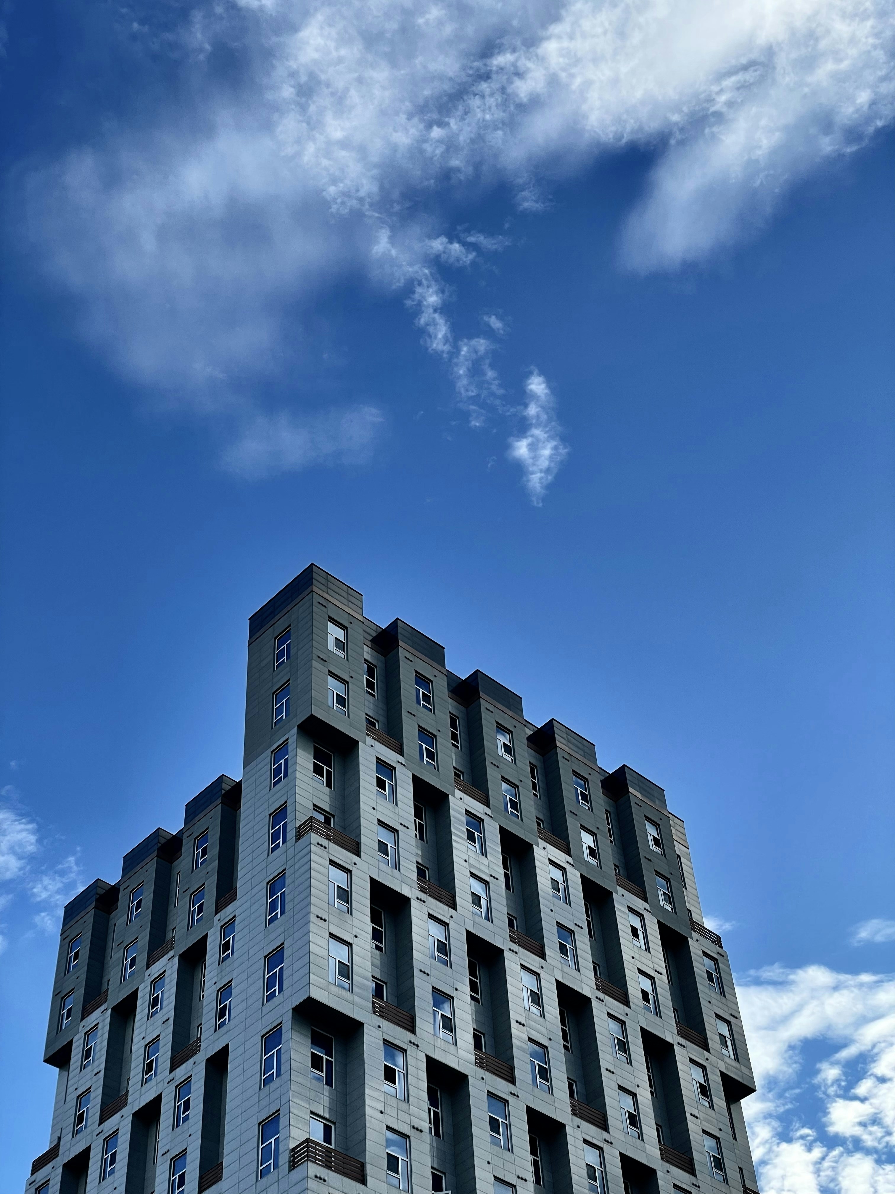 White concrete building under blue sky during daytime photo – Free ...