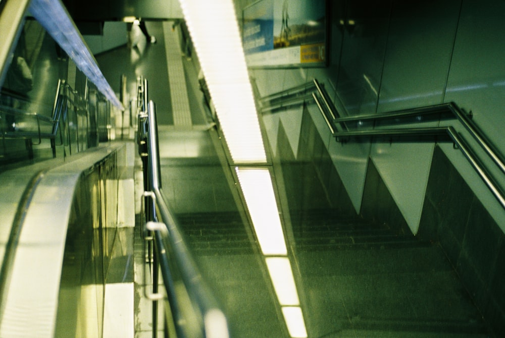 black and white escalator in a room