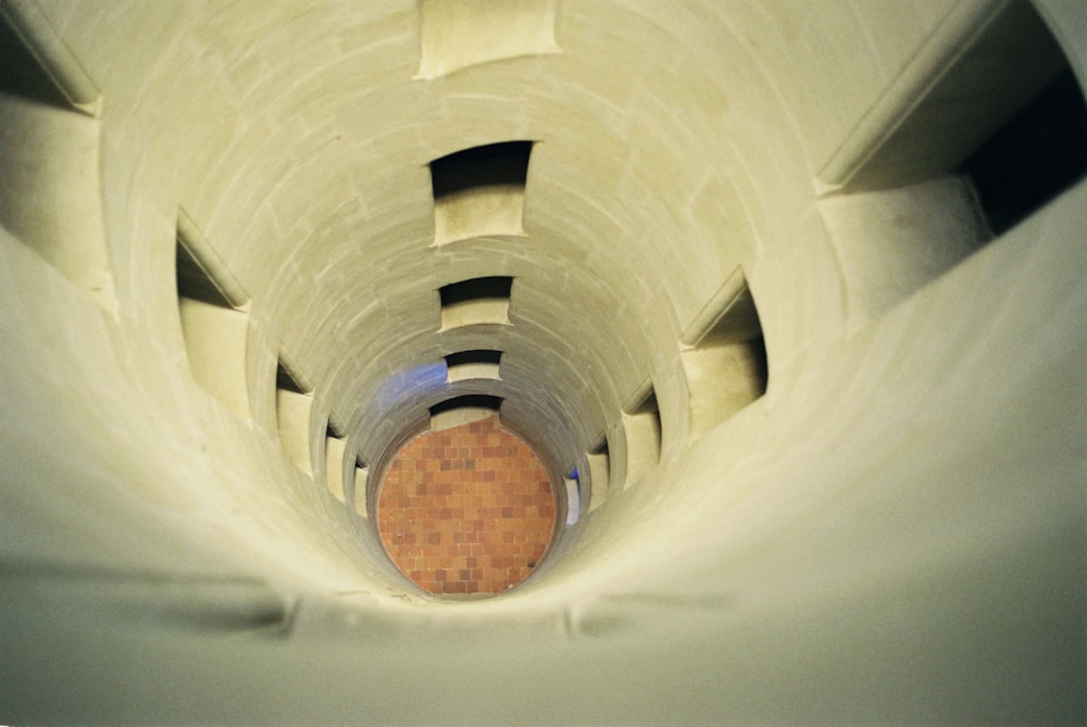 white and brown concrete tunnel