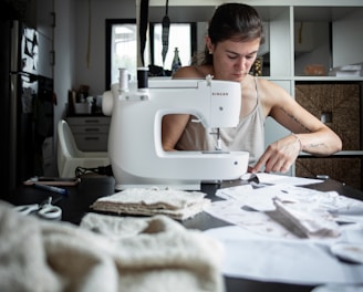 woman sewing at table