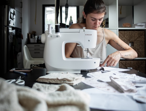 woman sewing at table