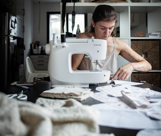 woman sewing at table