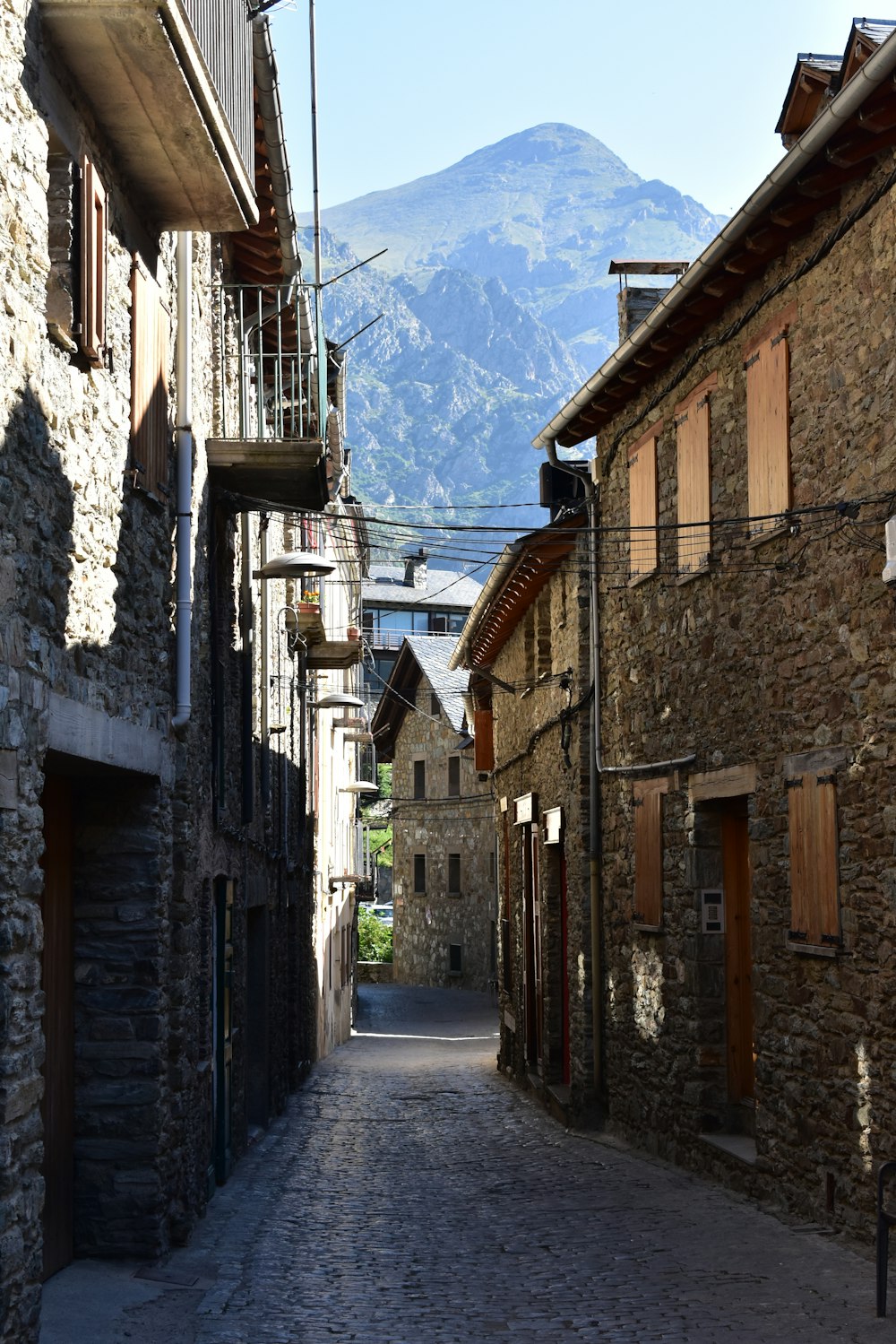 brown brick houses during daytime