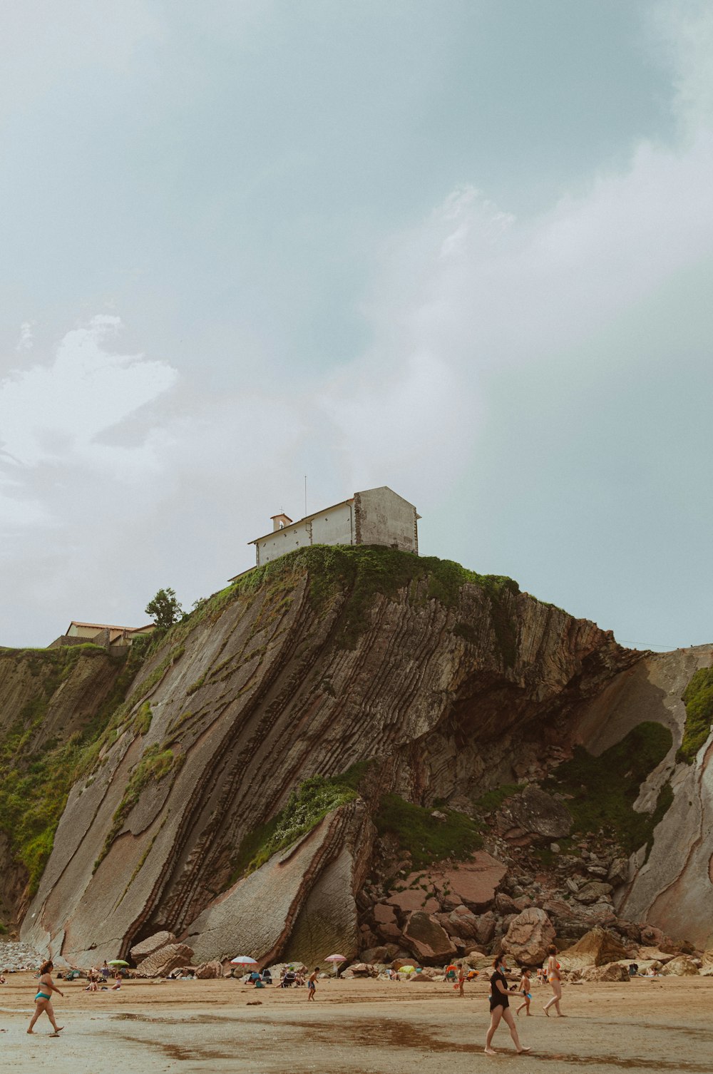 white concrete building on top of mountain