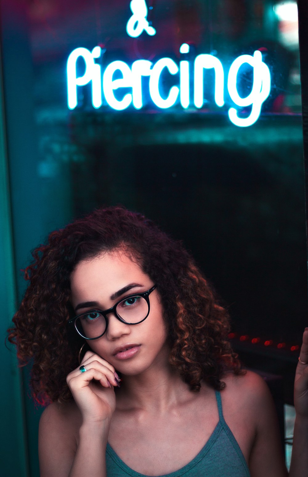 woman wearing black framed eyeglasses