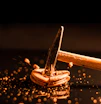 water droplets on brown wooden stick